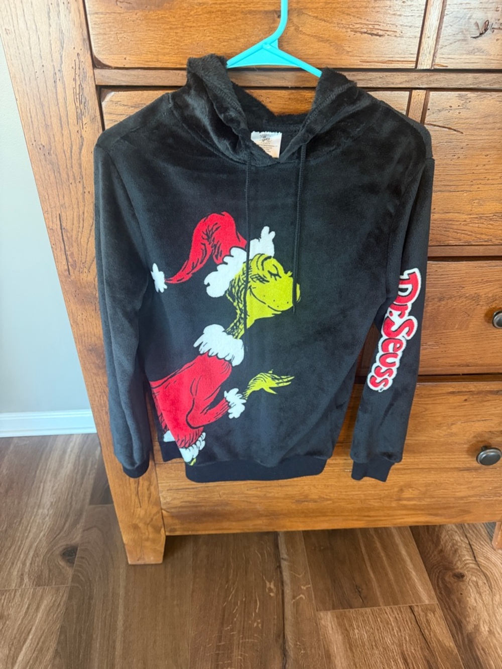 Dr. Seuss Black Crewneck Hoodie with Grinch Graphic in Red and Yellow